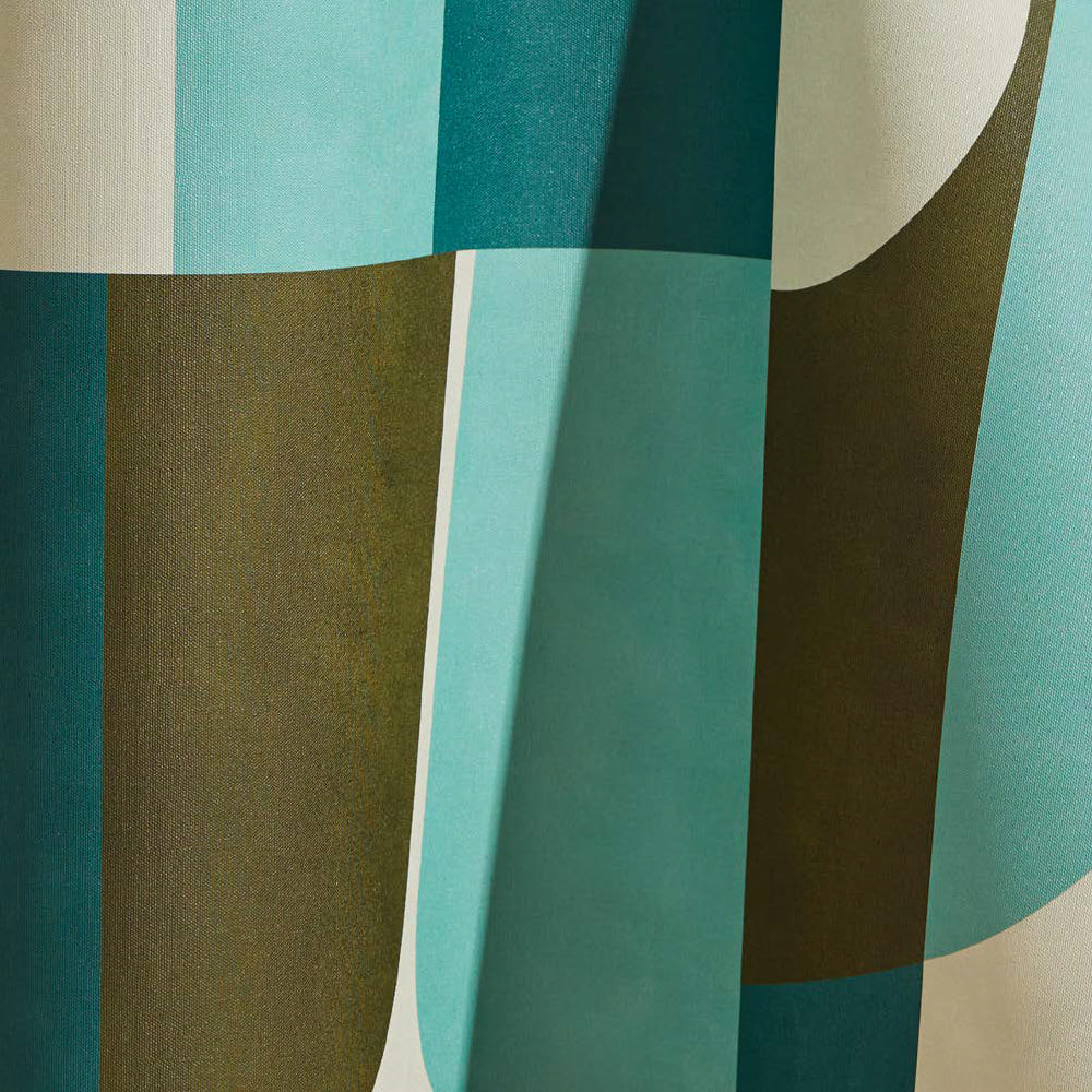 Draped wallpaper yardage in a curvilinear geometric grid print in shades of turquoise and green on a cream field.
