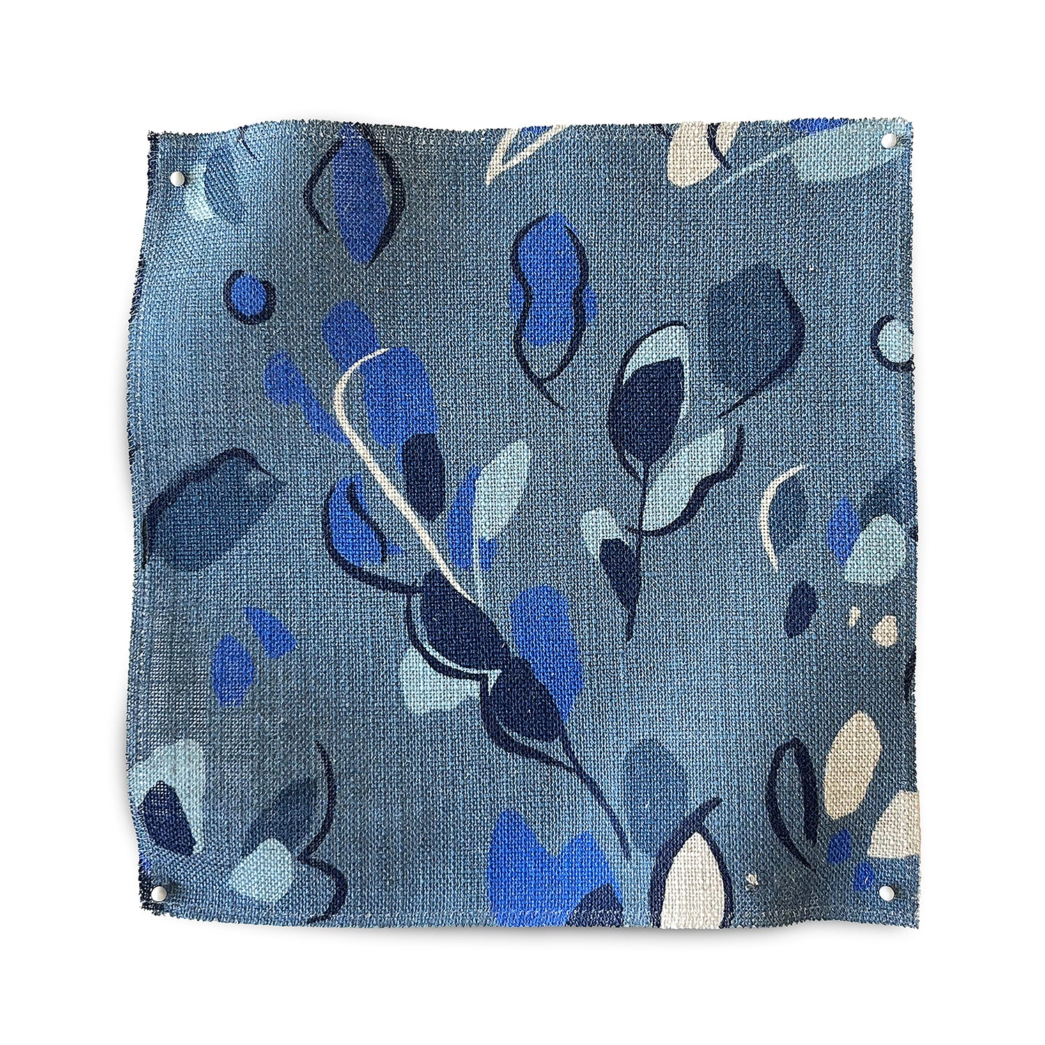 Square fabric swatch in a painterly leaf print in shades of white, blue and navy on a blue field.