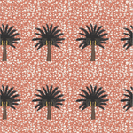 Detail of wallpaper in a repeating palm tree print on a mottled white and coral field.