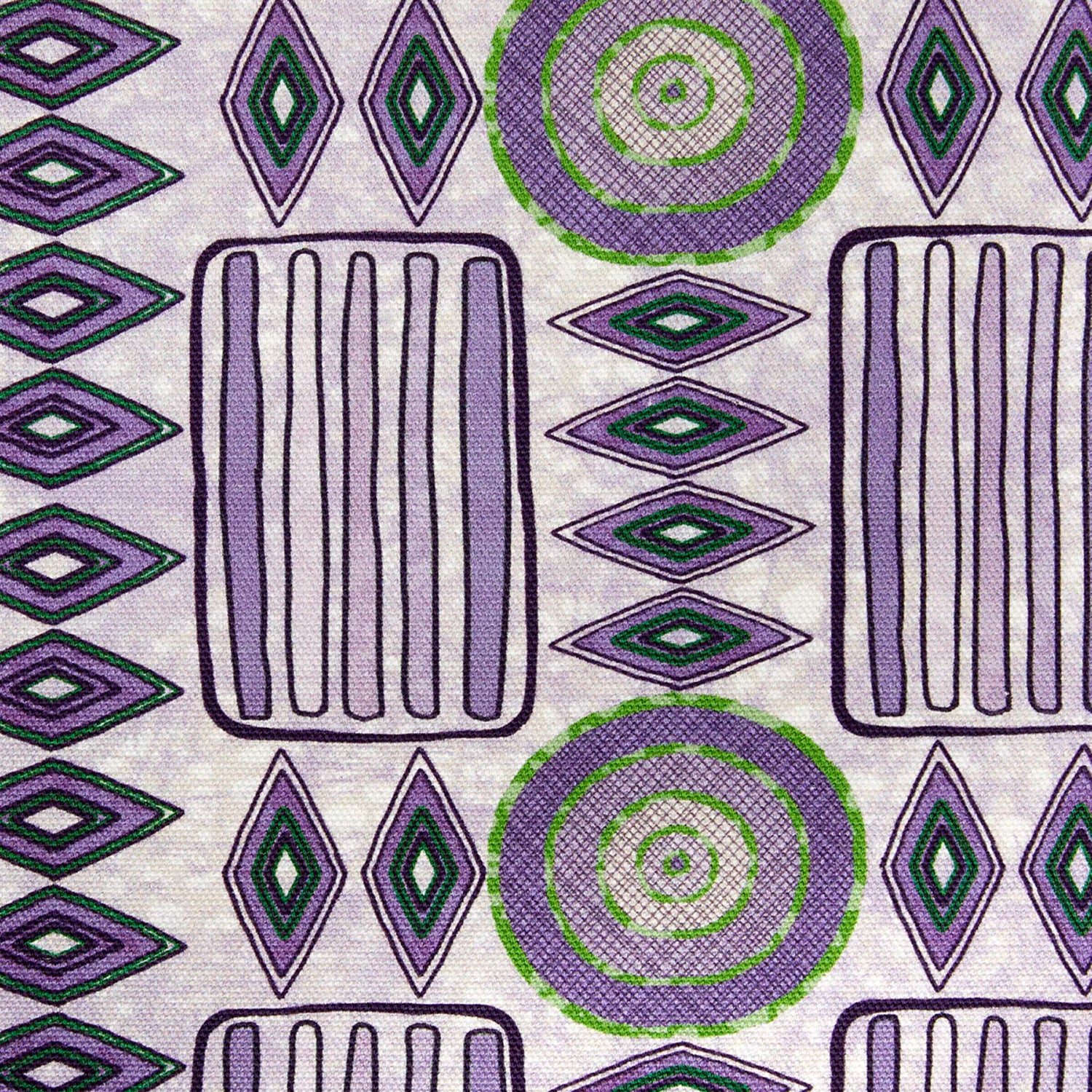 Detail of fabric in a playful geometric stripe print in shades of purple with green accents.