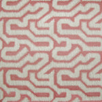 Detail of wallpaper in a playful meandering print in cream on a pink field.
