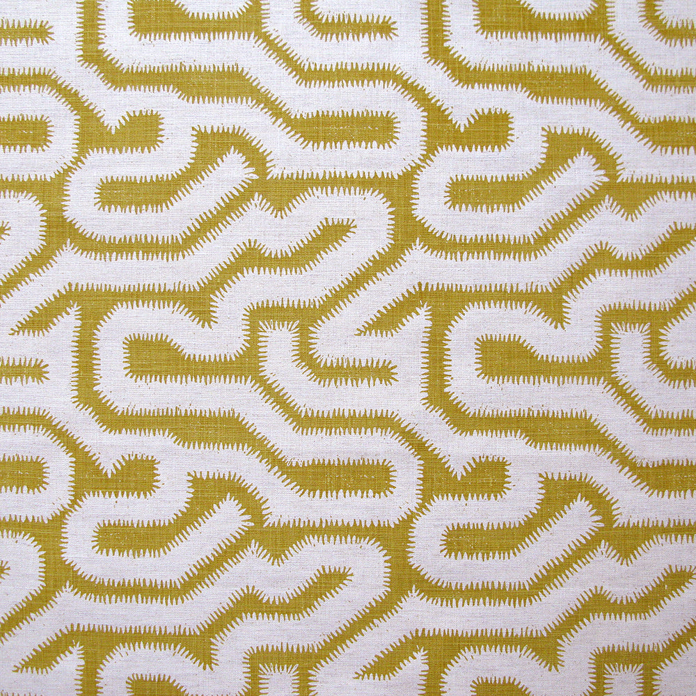 Detail of fabric in a playful meandering print in cream on a mustard field.
