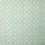 Detail of wallpaper in a floral grid print in white on a blue-green field.