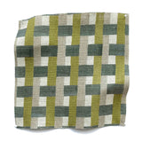 Square fabric swatch in an interlocking checked pattern in shades of tan, lime and green.