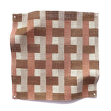 Square fabric swatch in an interlocking checked pattern in shades of pink, tan and brown.