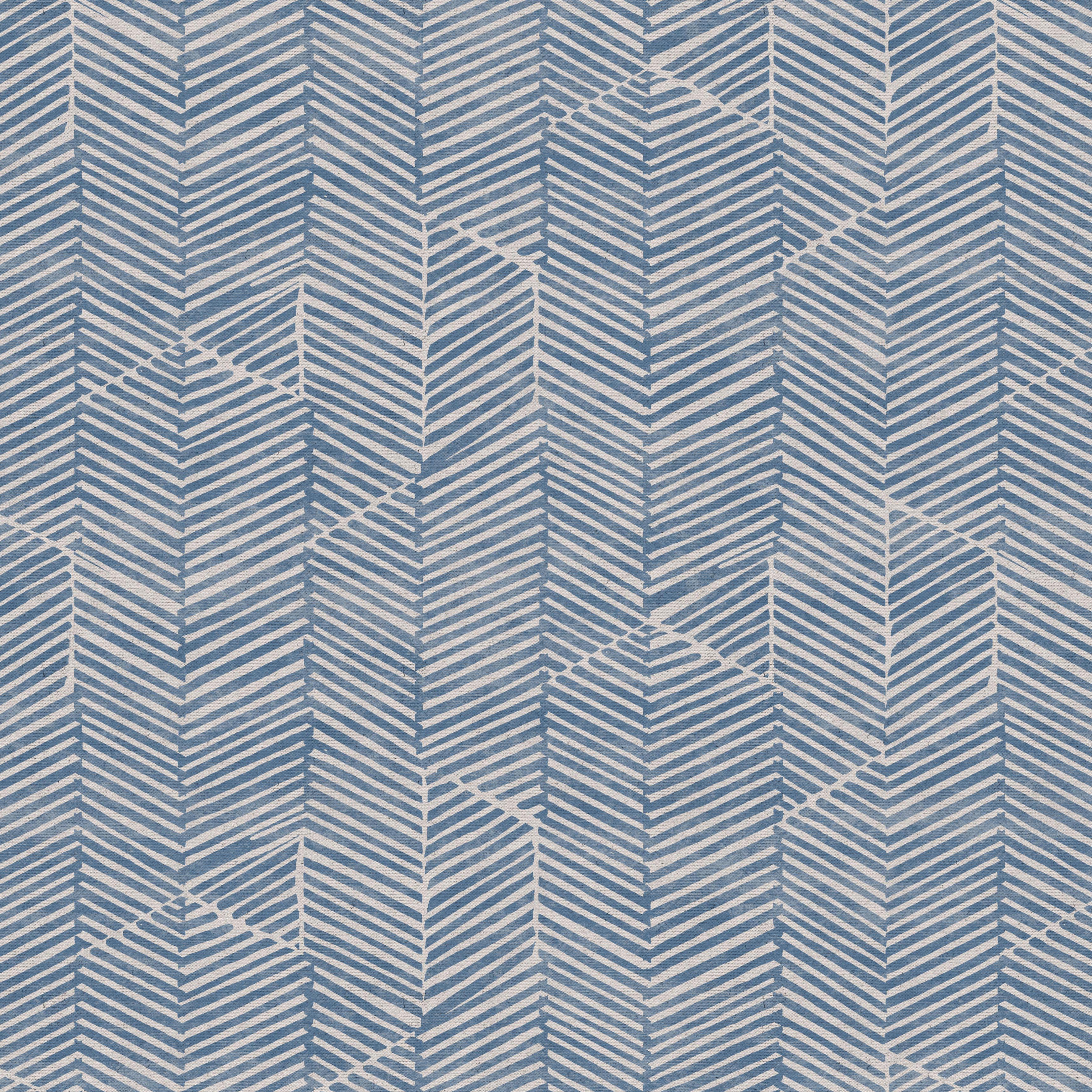 Detail of fabric in a dense herringbone print in dusty blue on a tan field.