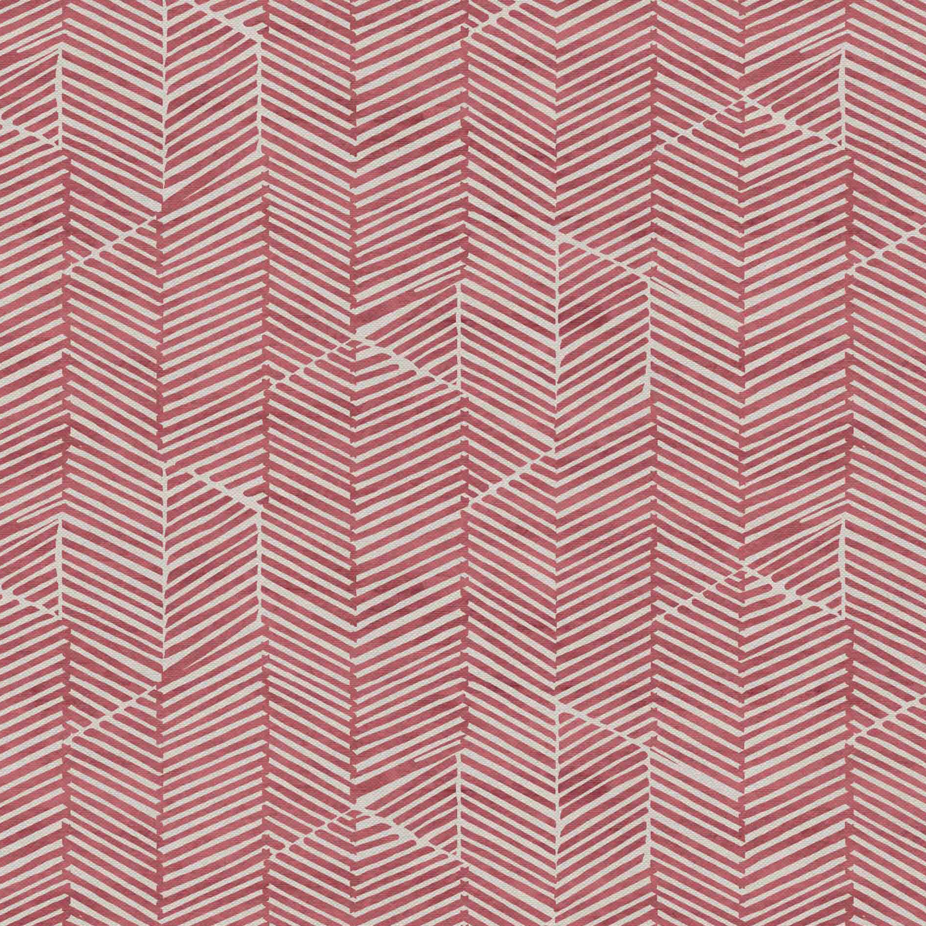 Detail of fabric in a dense herringbone print in rose on a tan field.