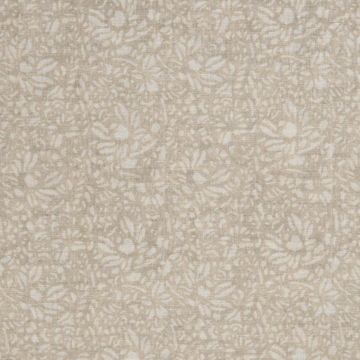 Detail of a printed linen fabric in a repeating chrysanthemum pattern in white on a cream field.