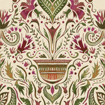 Detail of wallpaper in a floral damask print in shades of green and purple on a cream field.