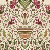 Detail of wallpaper in a floral damask print in shades of green and purple on a cream field.