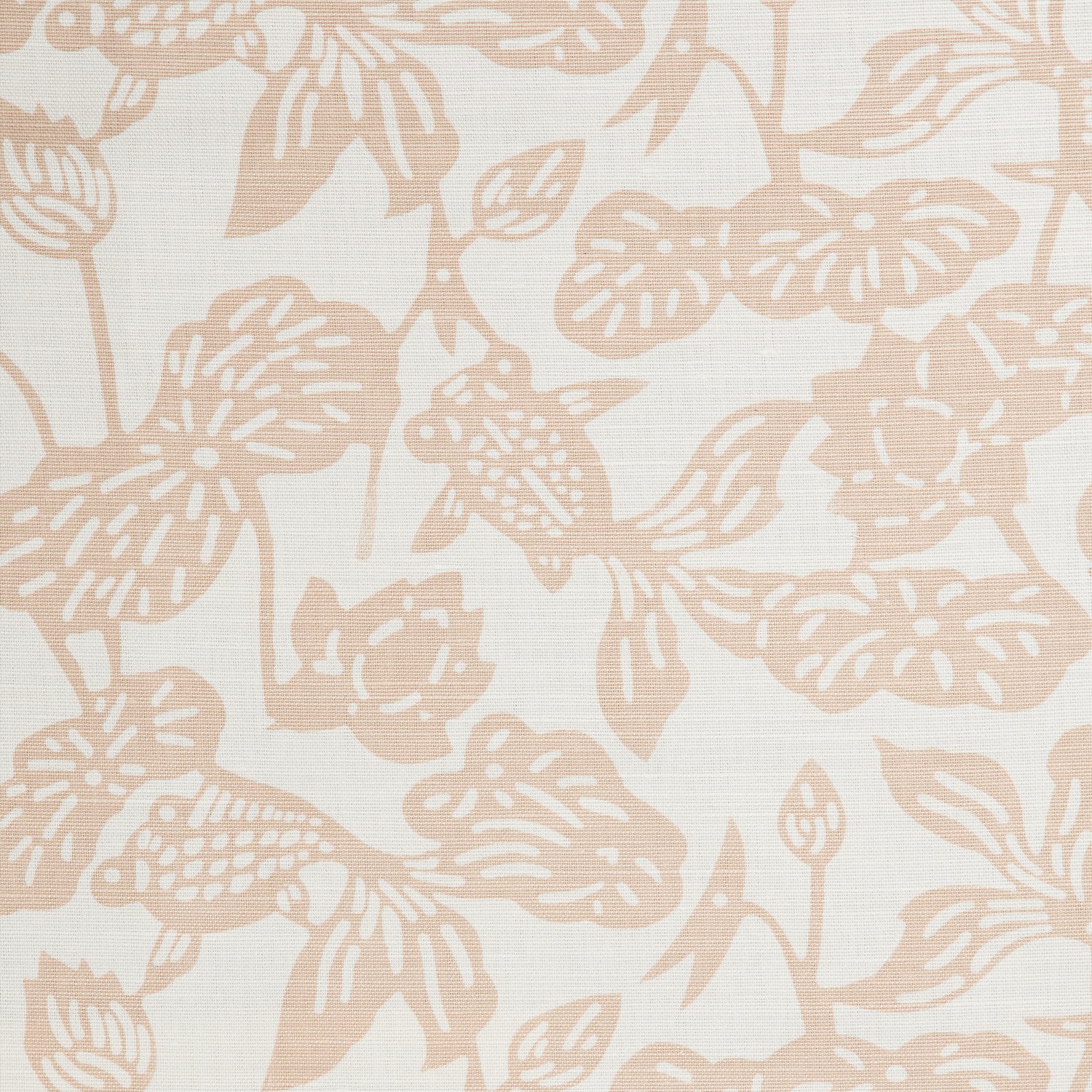 Detail of a cotton fabric in a repeating fish and leaf pattern in peach on a cream field.