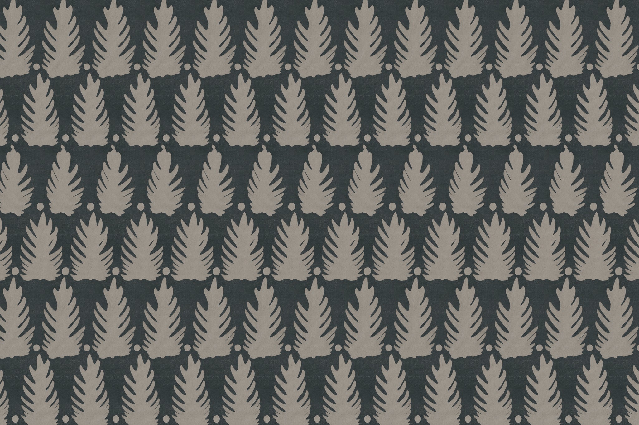 Detail of fabric in a linear leaf print in tan on a black field.