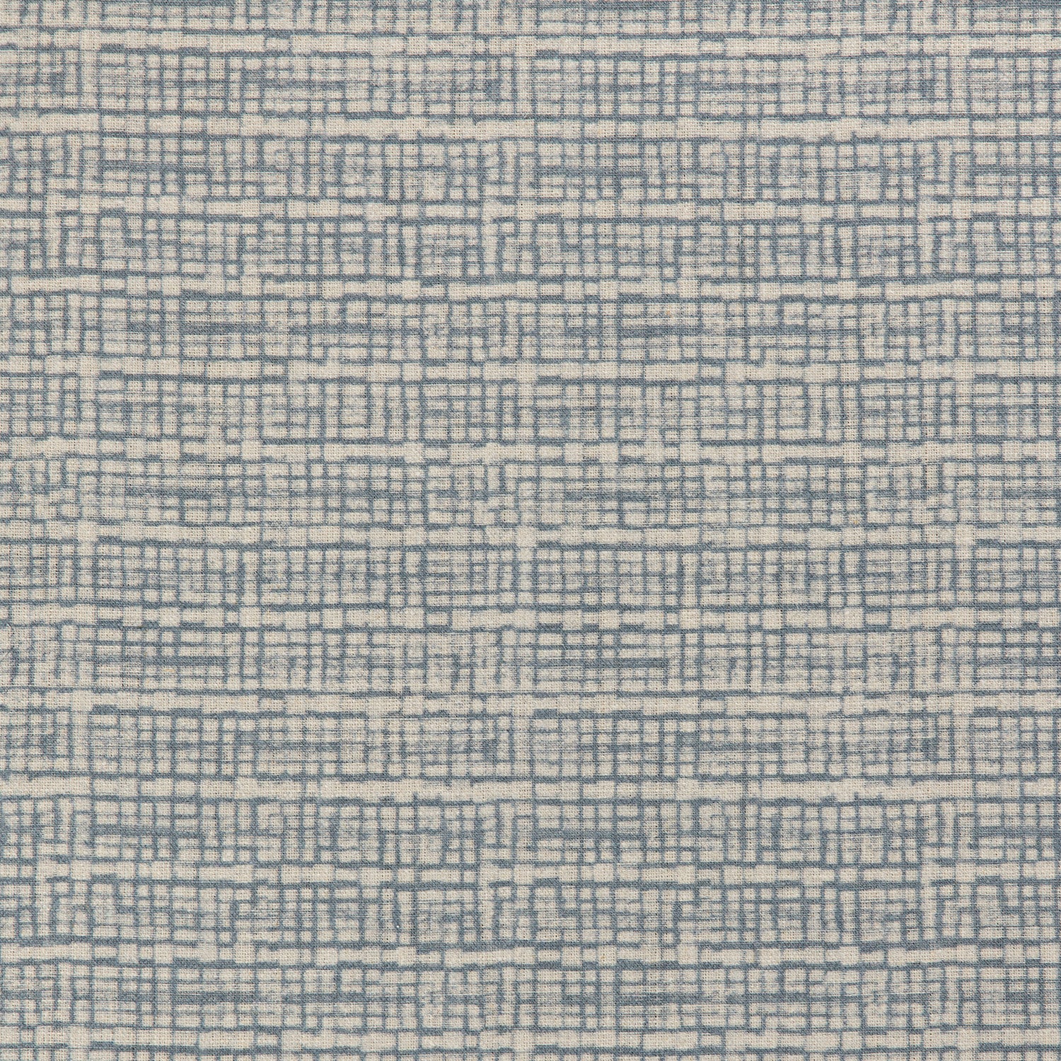 Detail of a linen fabric in a repeating abstract gridded pattern in navy on a cream field.