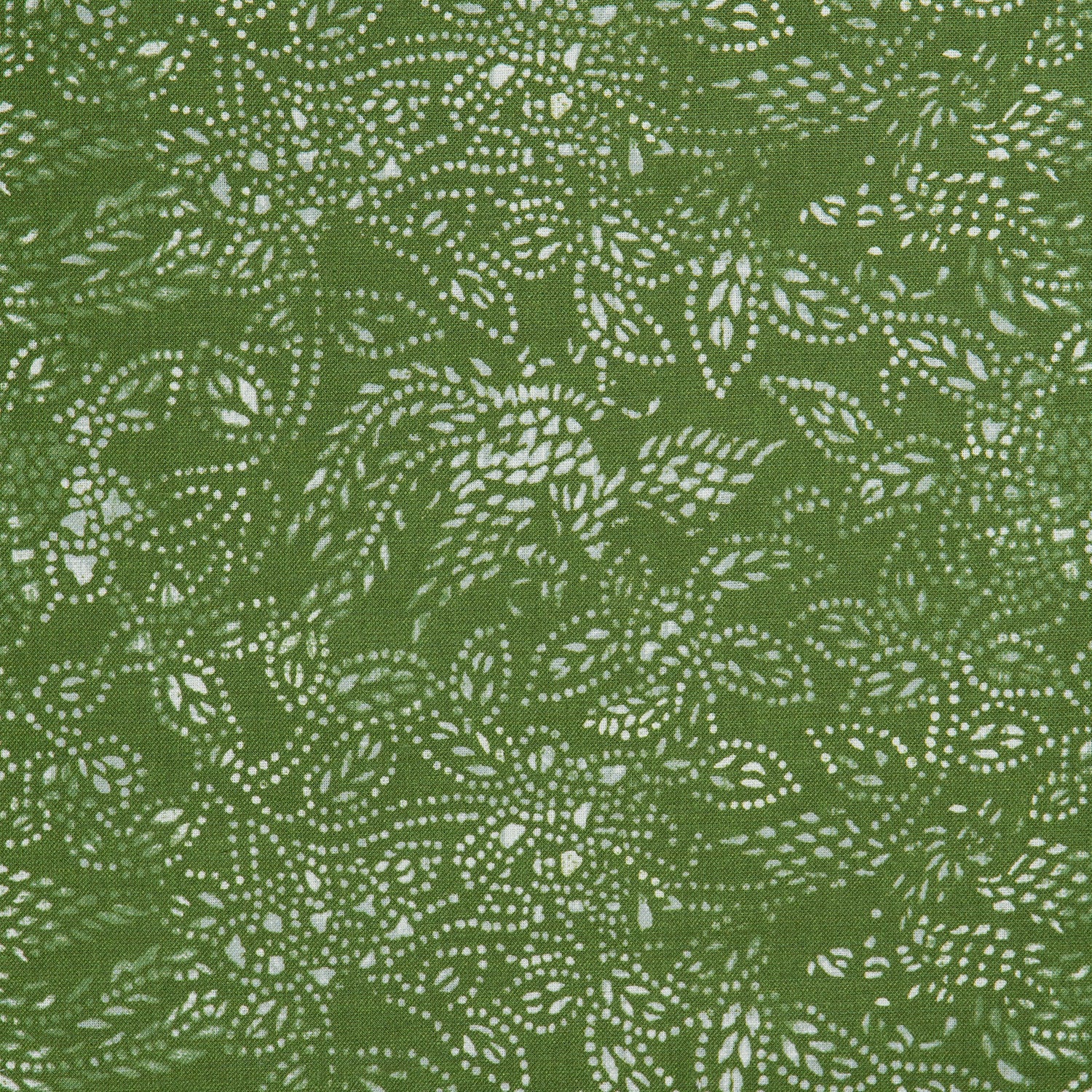Detail of a linen fabric in a dotted leaf pattern in white on a green field.