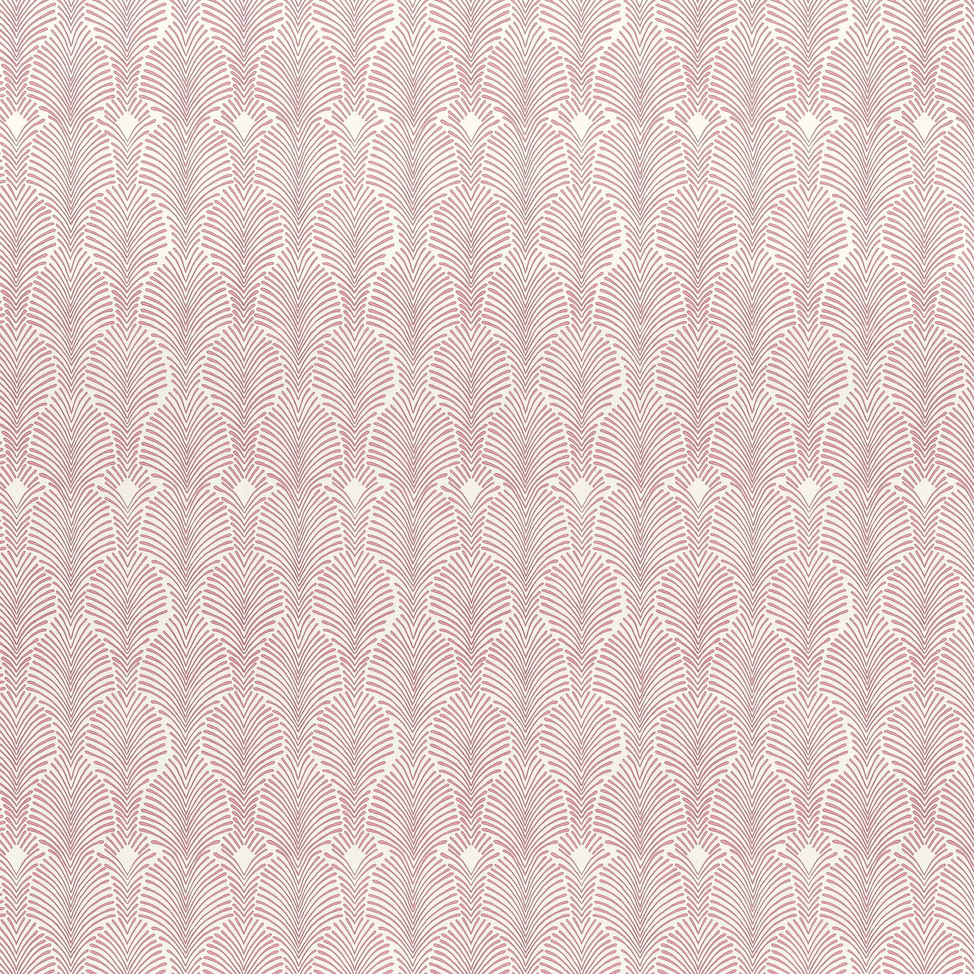 Detail of wallpaper in an art deco damask print in pink on a white field.