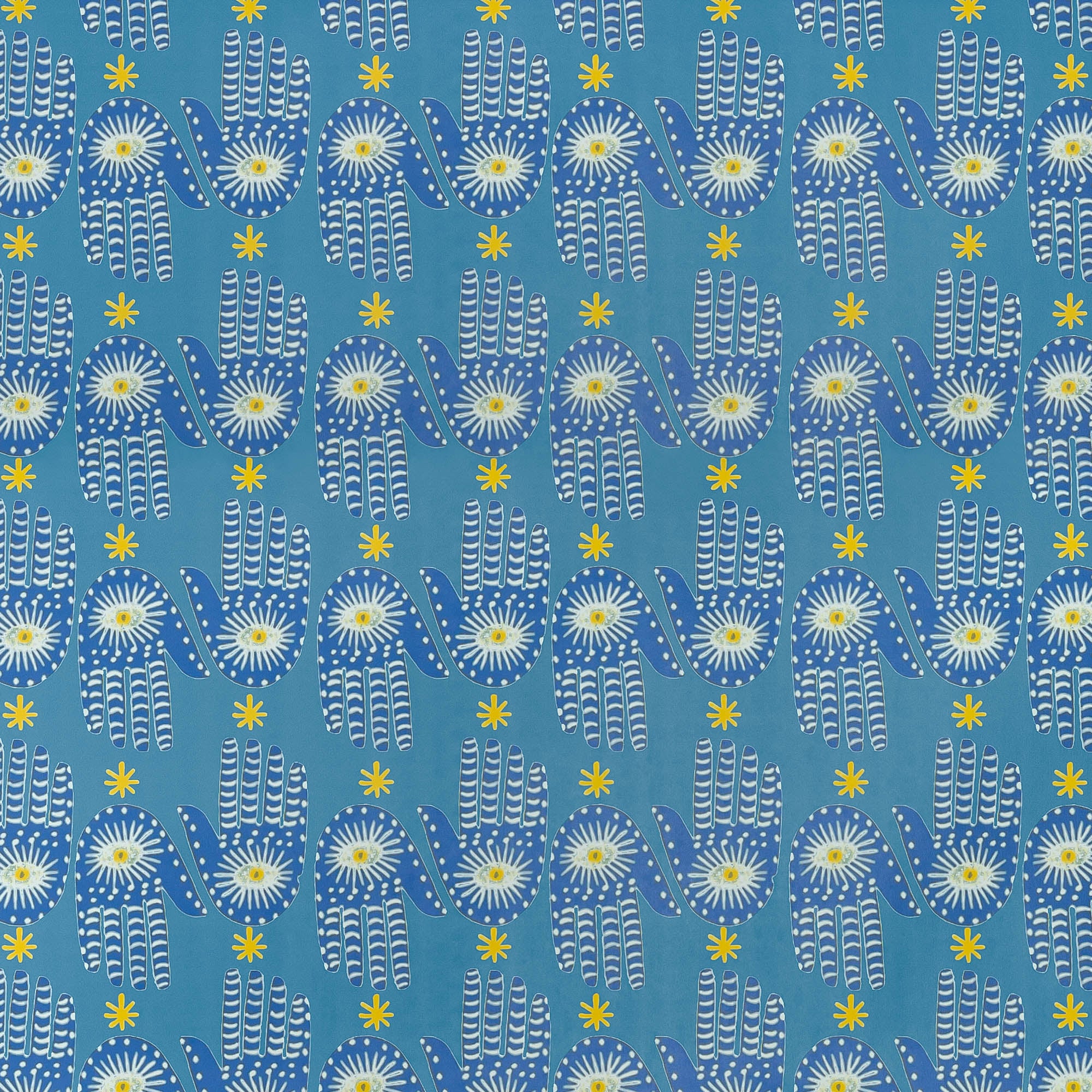 Detail of wallpaper in a playful hamsa hand print in white, navy and yellow on a blue field.