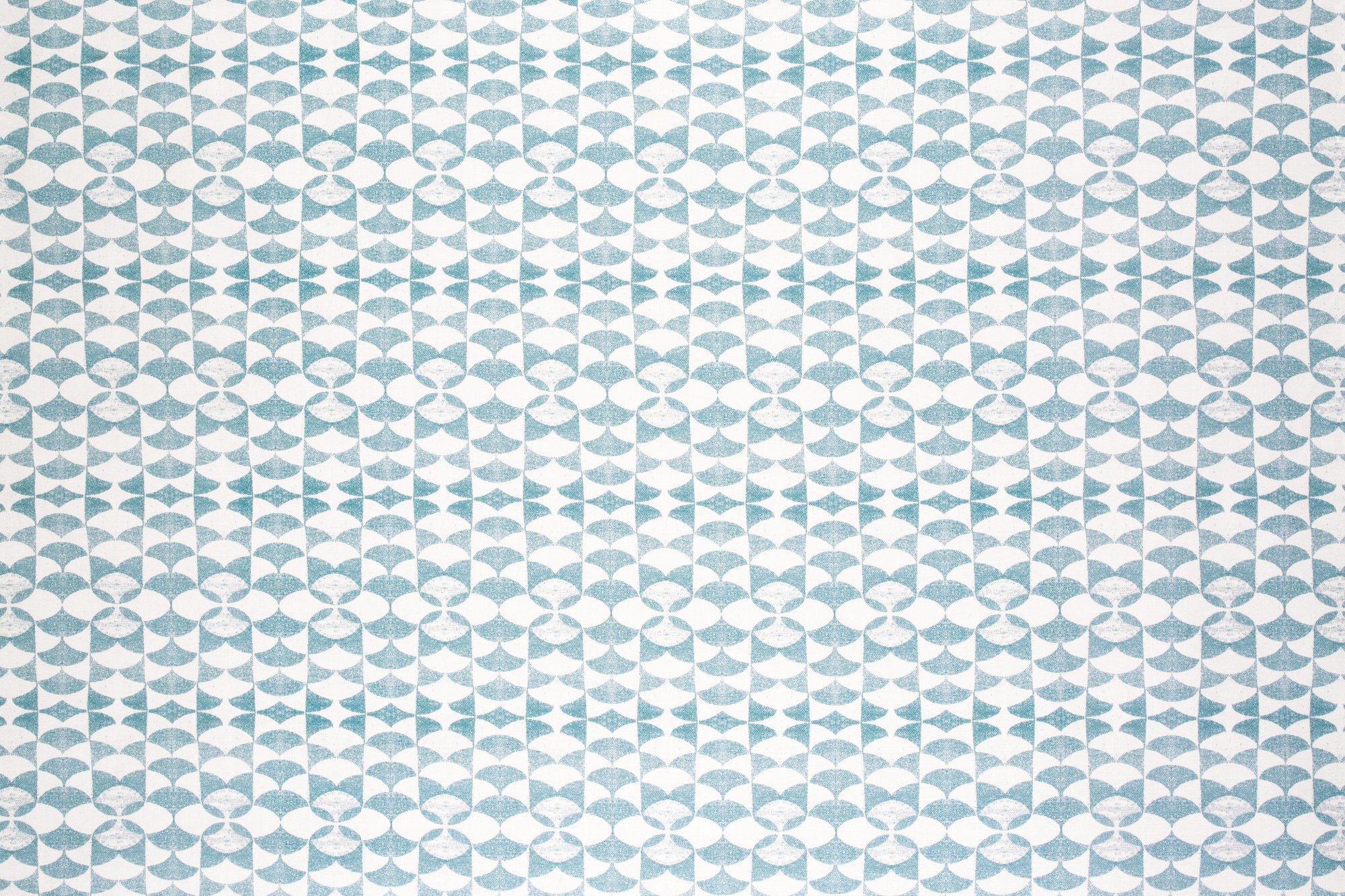Detail of fabric in a geometric stripe pattern in light blue on a white field.