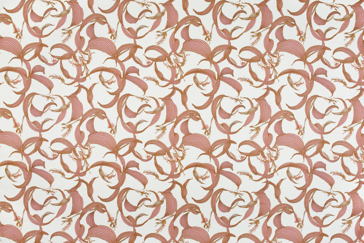 Detail of fabric in an abstract floral print in shades of pink on a cream field.