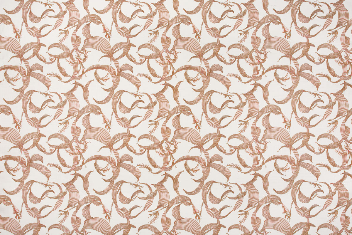 Detail of fabric in an abstract floral print in dusty rose on a cream field.