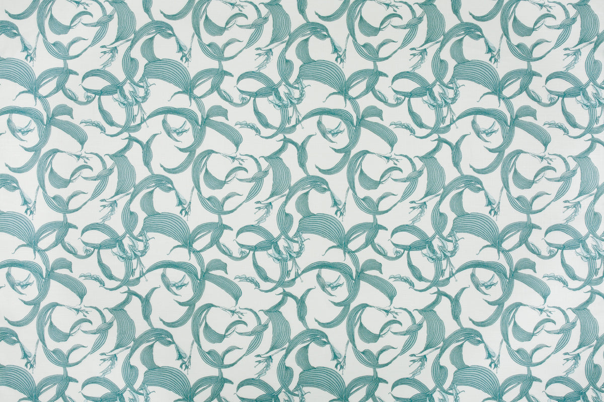 Detail of fabric in an abstract floral print in shades of blue on a cream field.