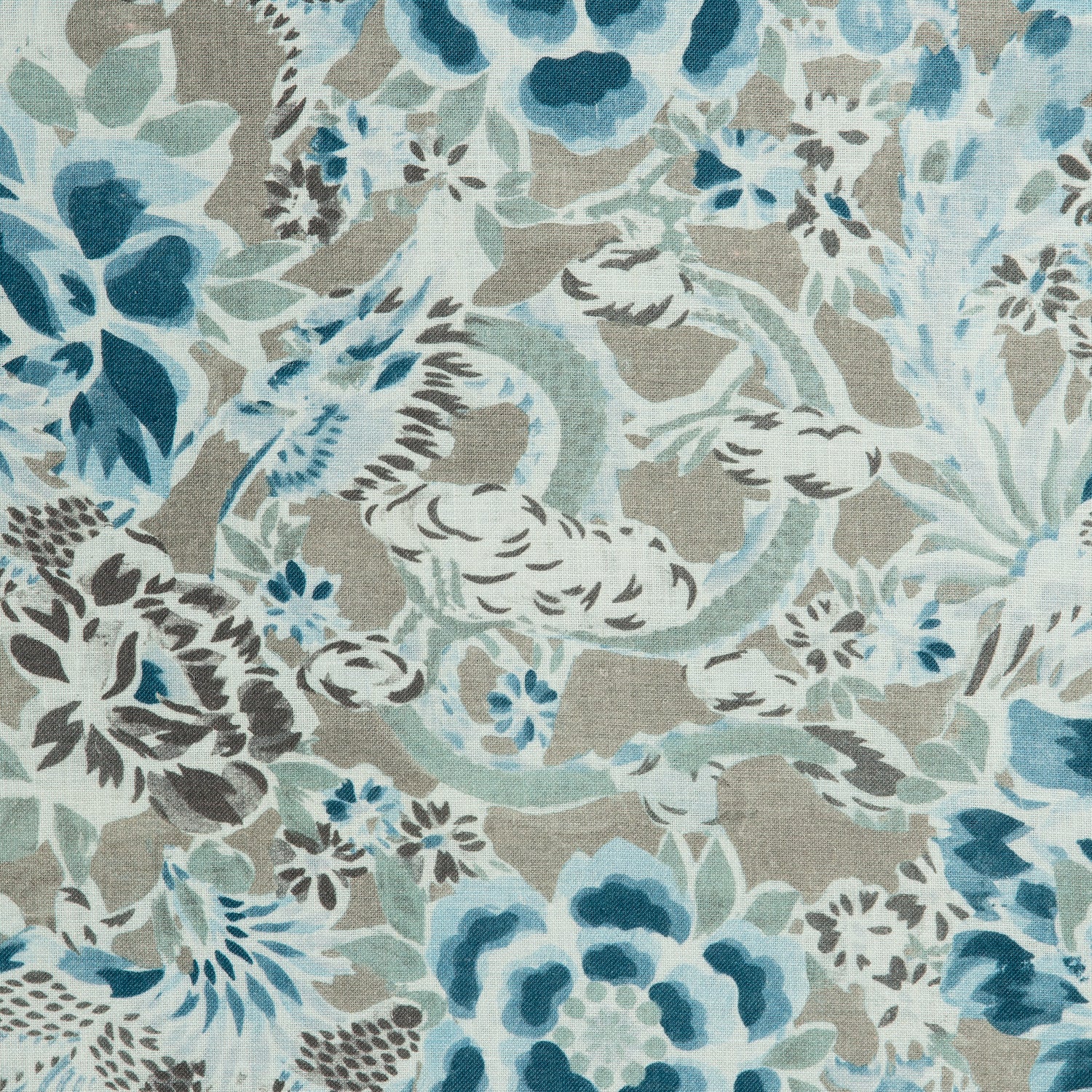Detail of a linen fabric in a painterly floral pattern in shades of blue and brown on a greige field.