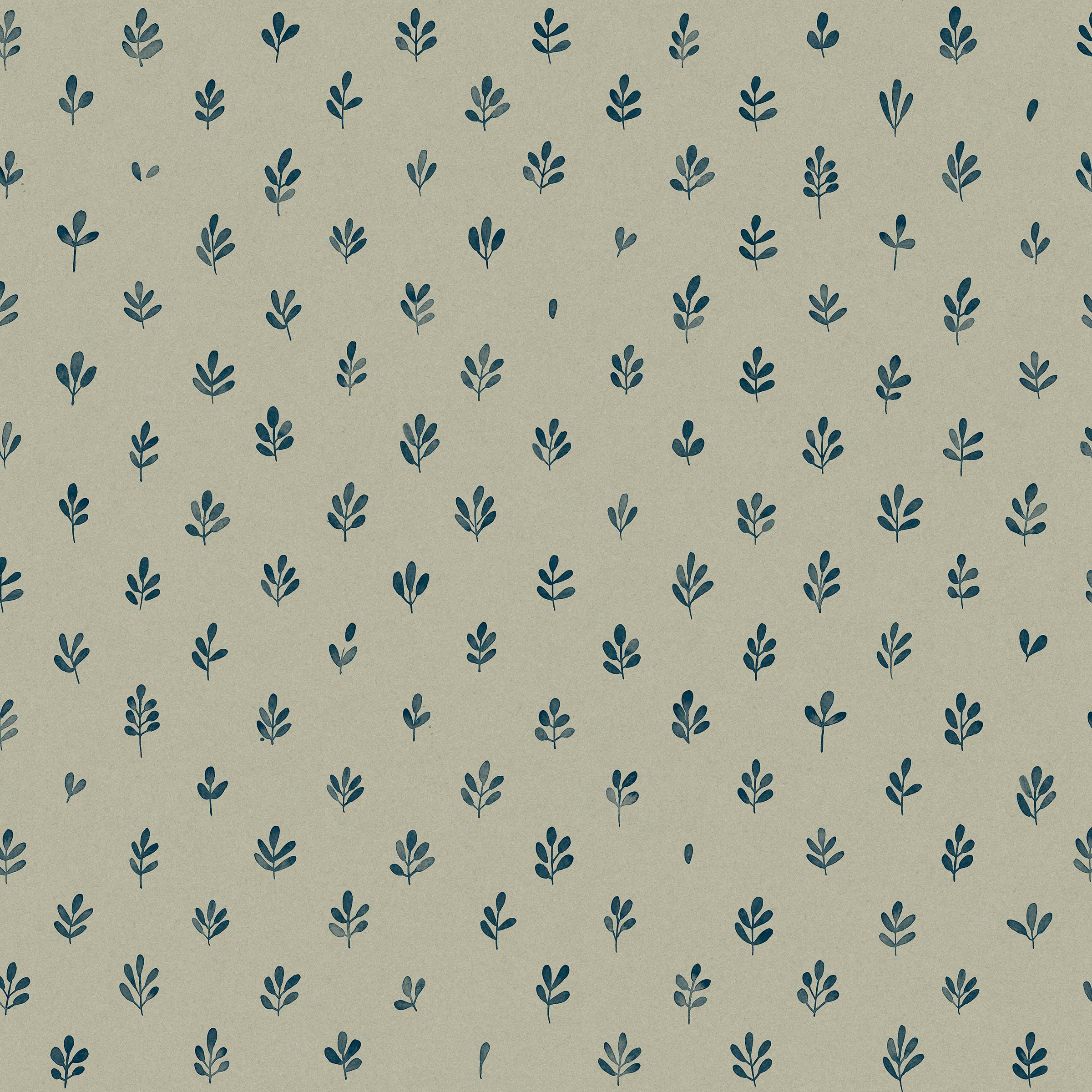 Detail of wallpaper in a repeating leaf print in navy on a sage field.