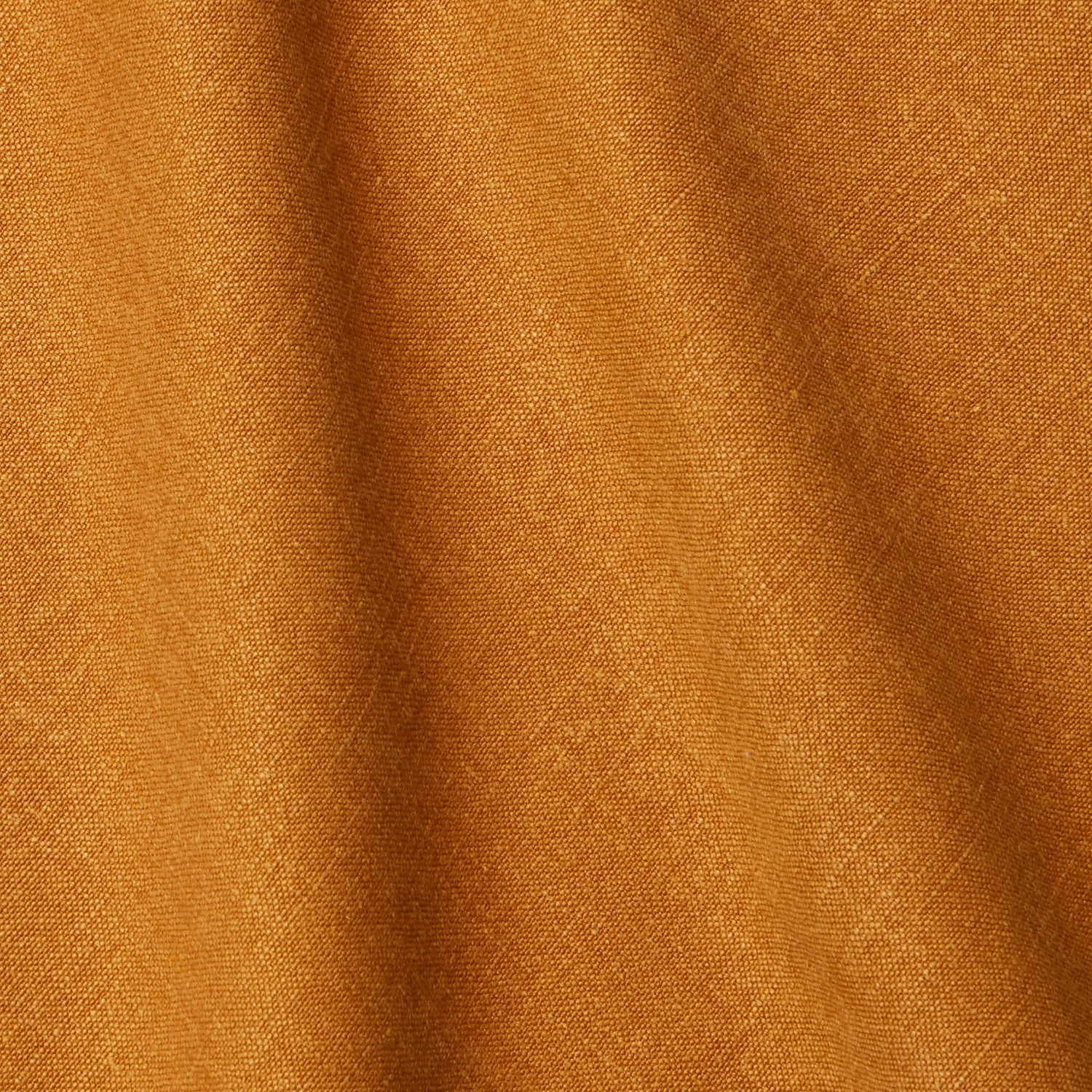 A draped swatch of linen fabric in a solid gold color.