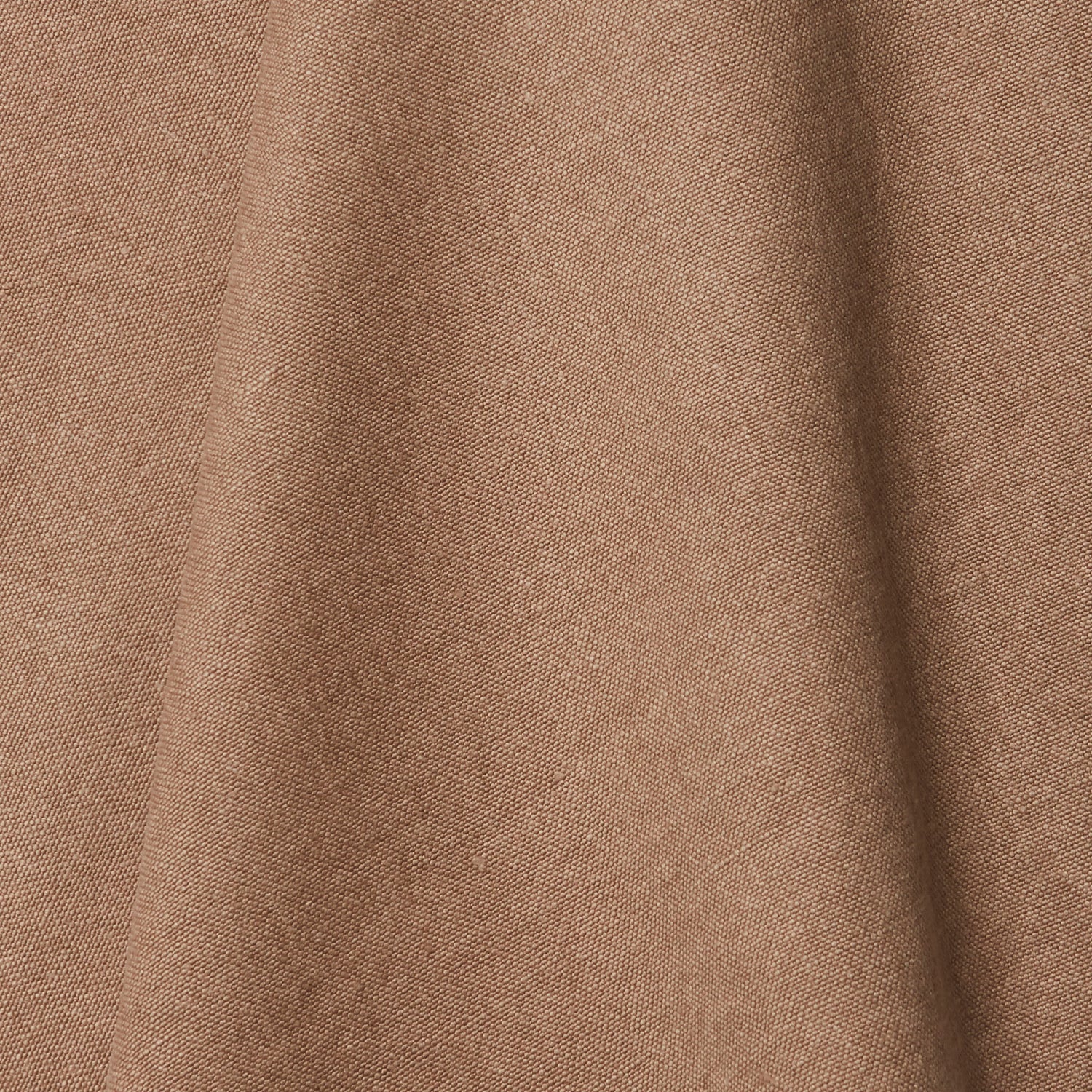 A draped swatch of linen fabric in a solid light brown color.
