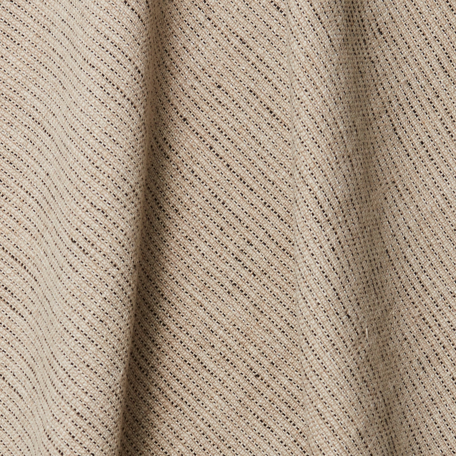 A draped swatch of linen fabric with a small-scale pattern of dark brown dashes on a tan background.