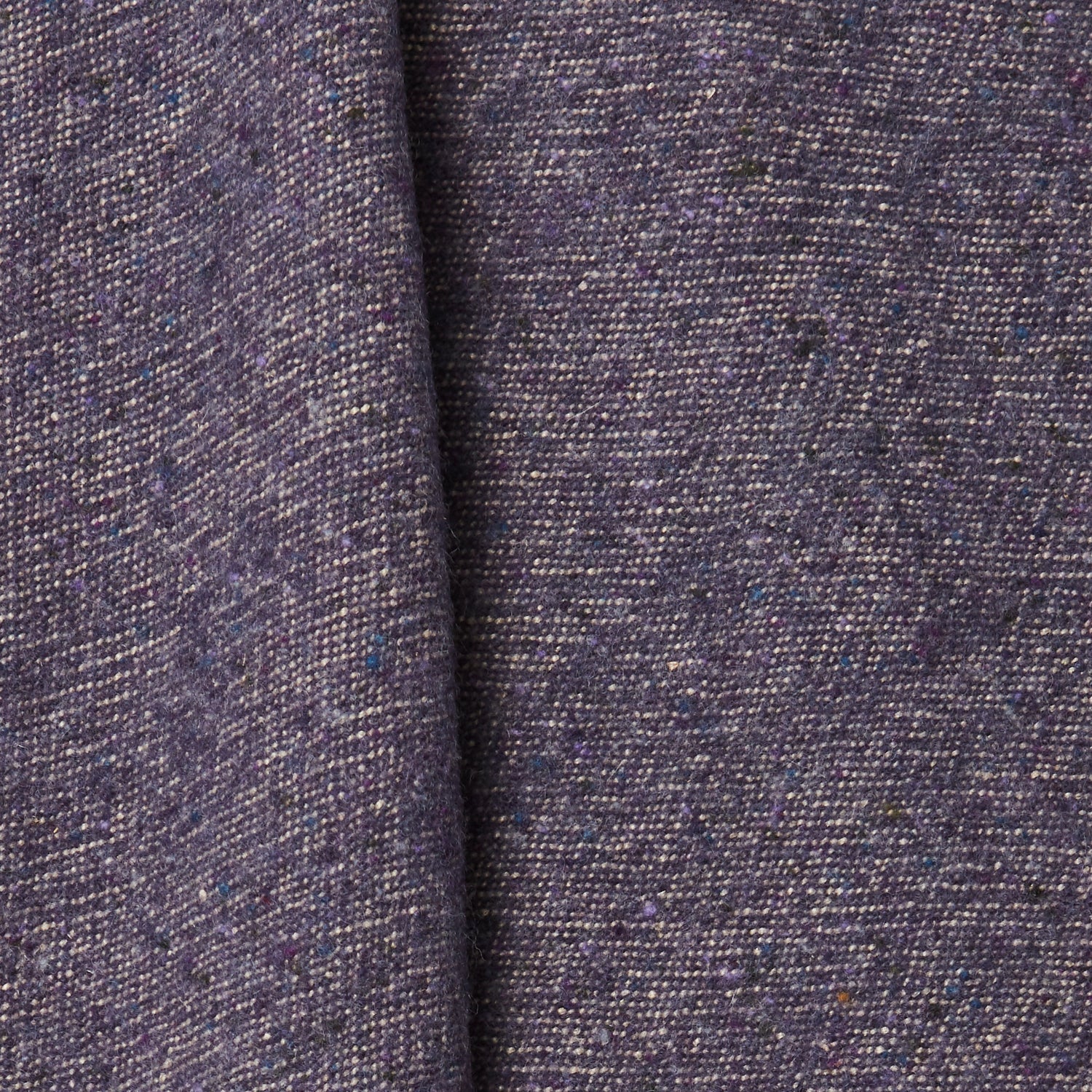 A draped swatch of blended linen-wool mix fabric in a flecked purple color.