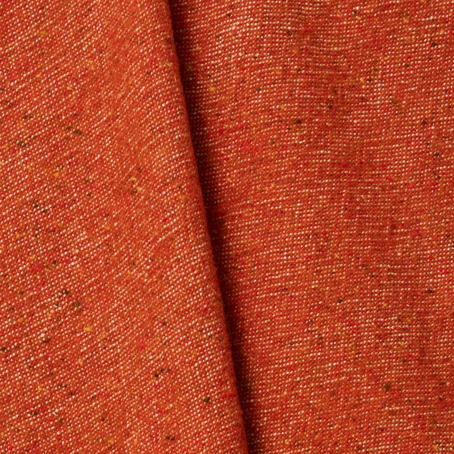 A draped swatch of blended linen-wool mix fabric in a flecked red color.