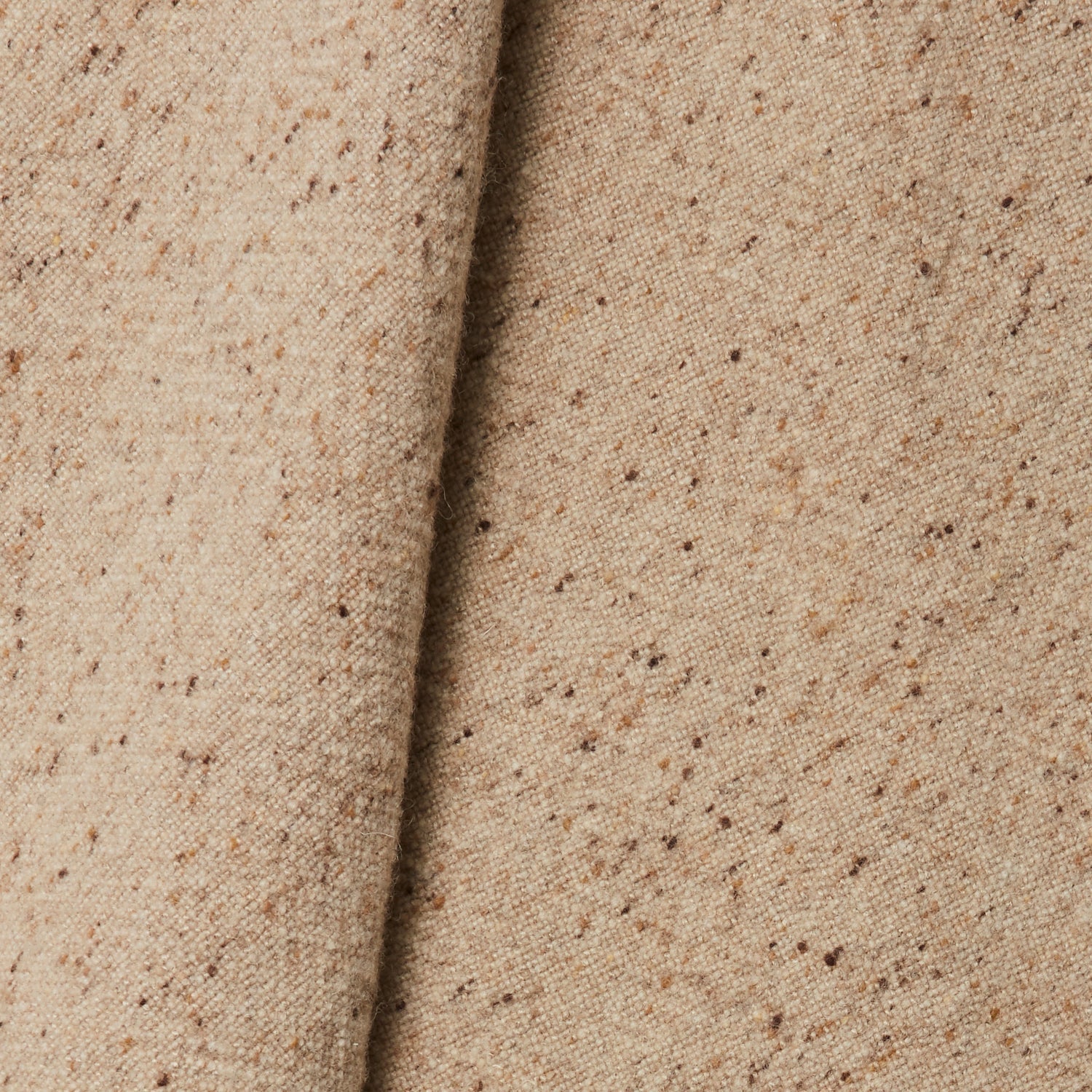 A draped swatch of blended linen-wool mix fabric in a flecked tan color.