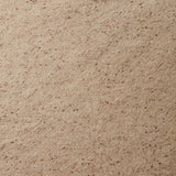 A swatch of blended linen-wool mix fabric in a flecked tan color.