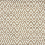 Detail of a handowven rug in an diamond like pattern in white and soft pink.
