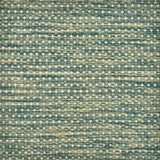 Detail of a handowven rug with a textural strié pattern in shades of green