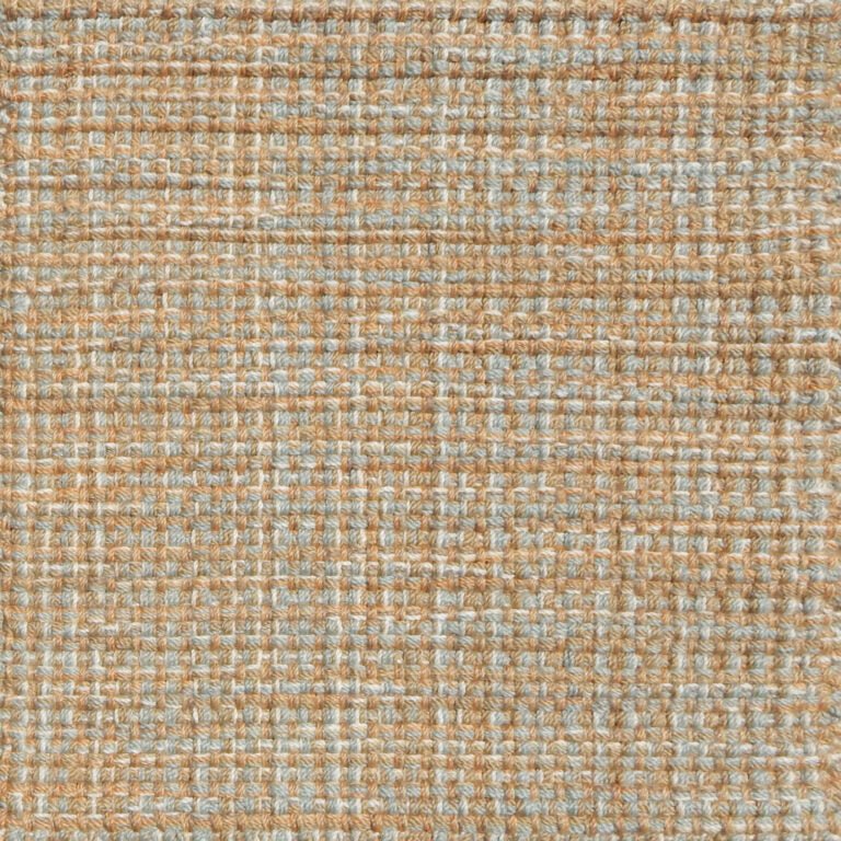 Detail of a flatweave with a strié effect in blue and camel