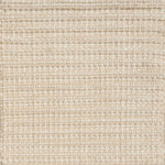 Detail of a flatweave with a strié effect in shades of cream