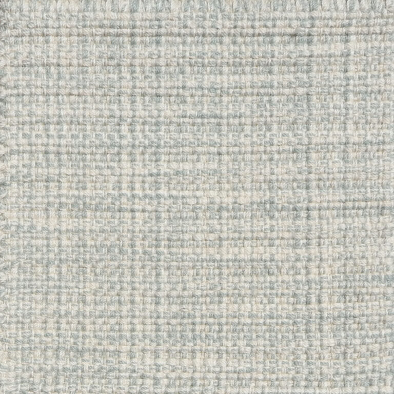 Detail of a flatweave with a strié effect in shades of light blue