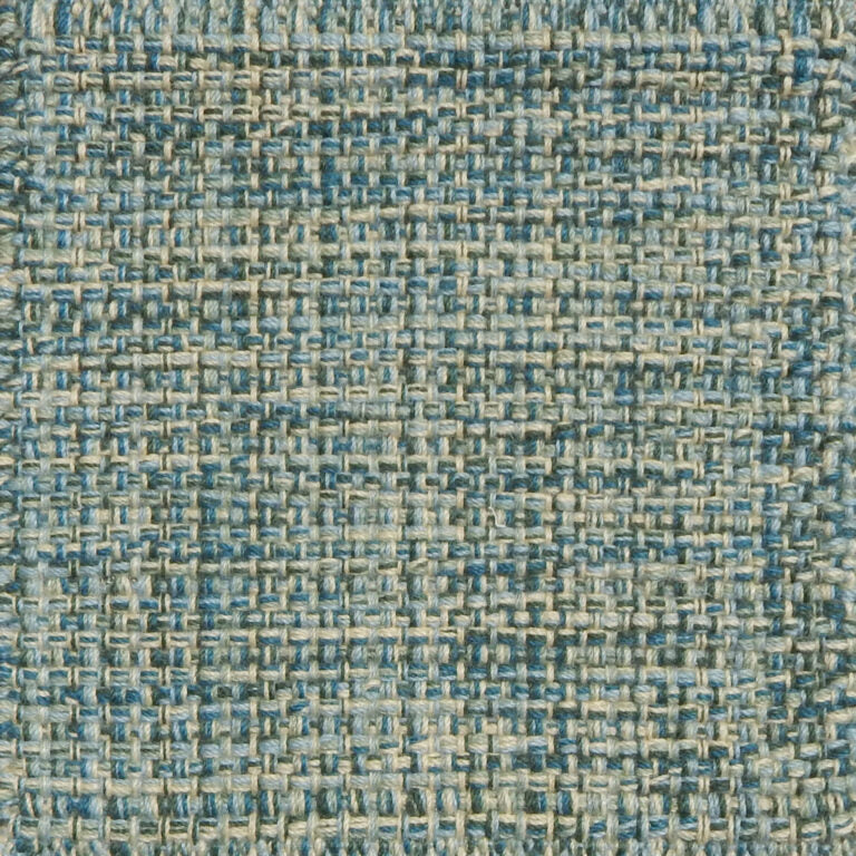 Detail of a flatweave with a strié effect in shades of turquoise