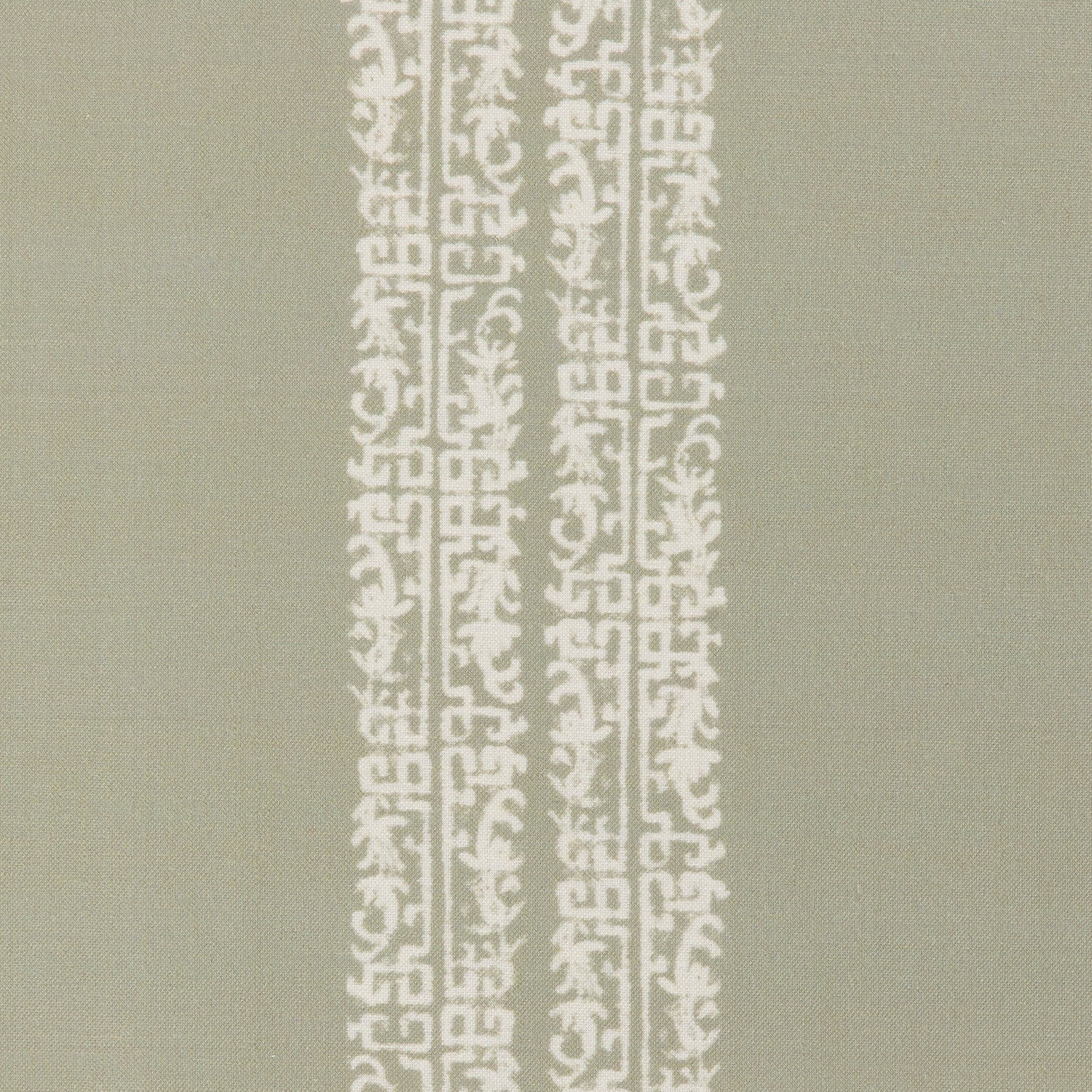 Detail of a linen fabric in a scrolling floral stripe pattern in cream on a light sage field.