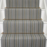 Striped flatweave runner in blue green and grey on white staircase