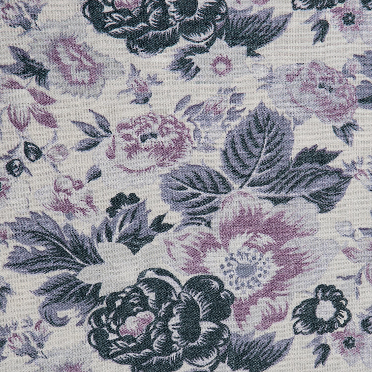 Detail of a linen fabric in a detailed floral pattern in shades of purple and gray on a light gray field.