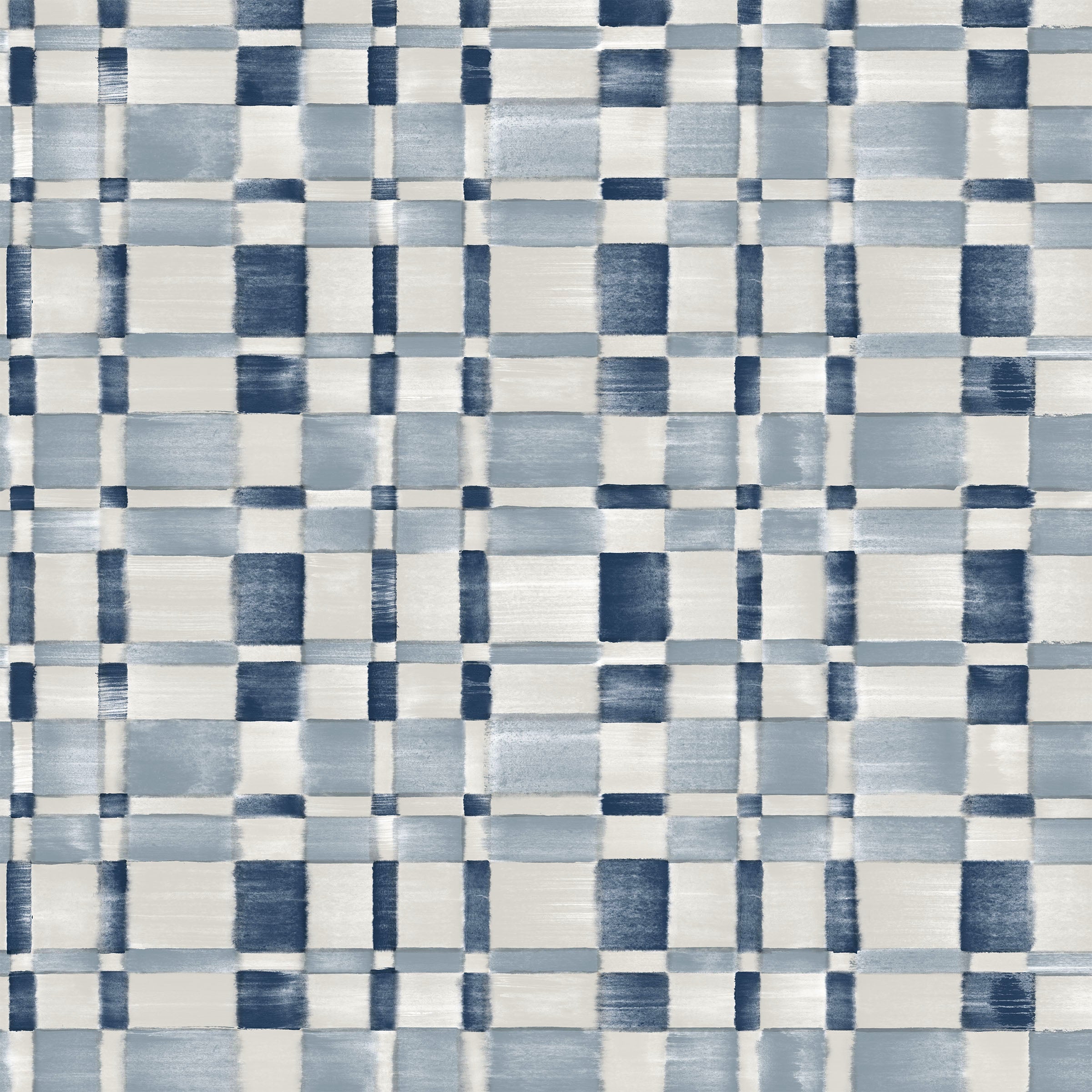 Detail of fabric in a large-scale checked pattern in shades of cream and blue.