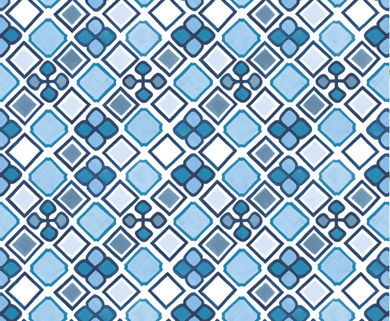 Detail of fabric in a geometric diamond and floral print in shades of blue, navy and white.