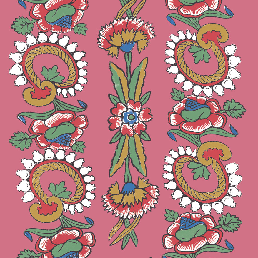 Detail of wallpaper in a dense floral stripe in red, green and blue on a dusty rose field.