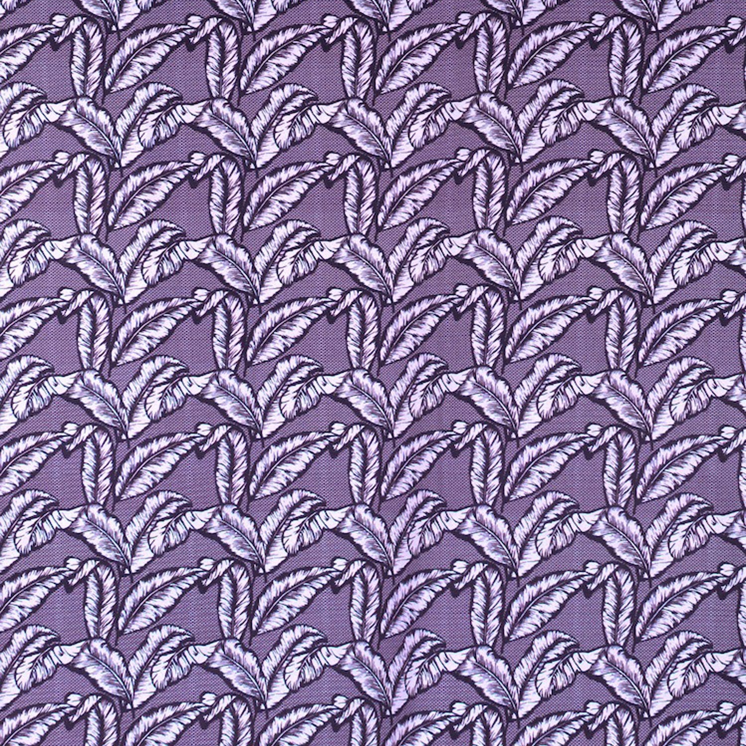 Detail of fabric in a dense leaf print in shades of purple on a purple field.