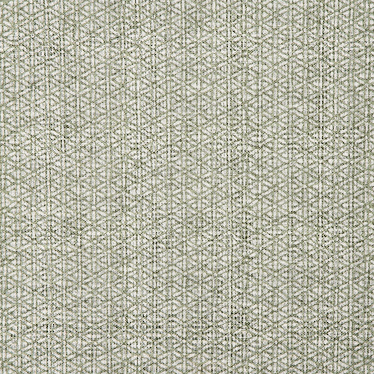 Detail of a linen fabric in a detailed geometric pattern in white on a light green field.