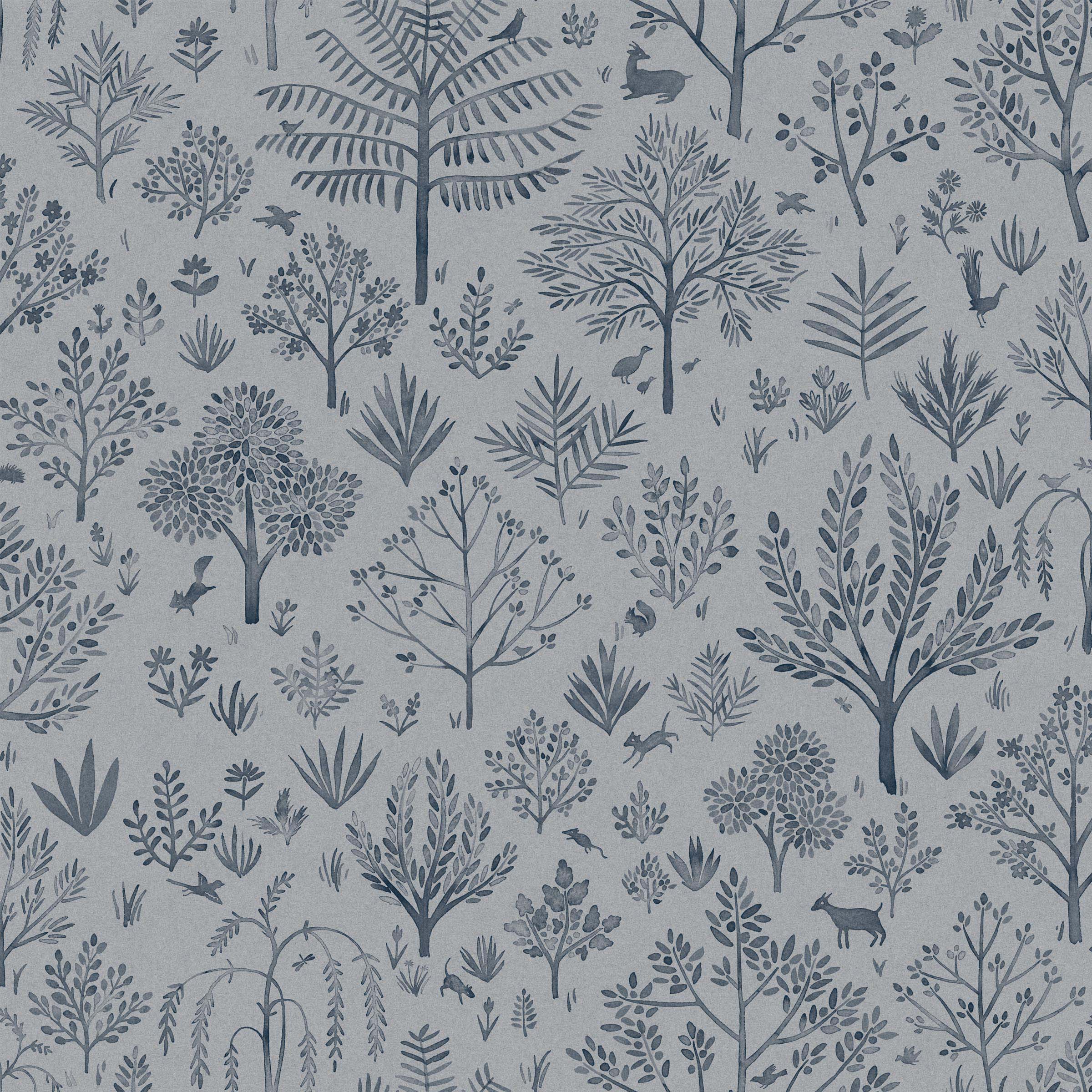 Detail of fabric in a playful animal and tree print in navy on a blue-gray field.