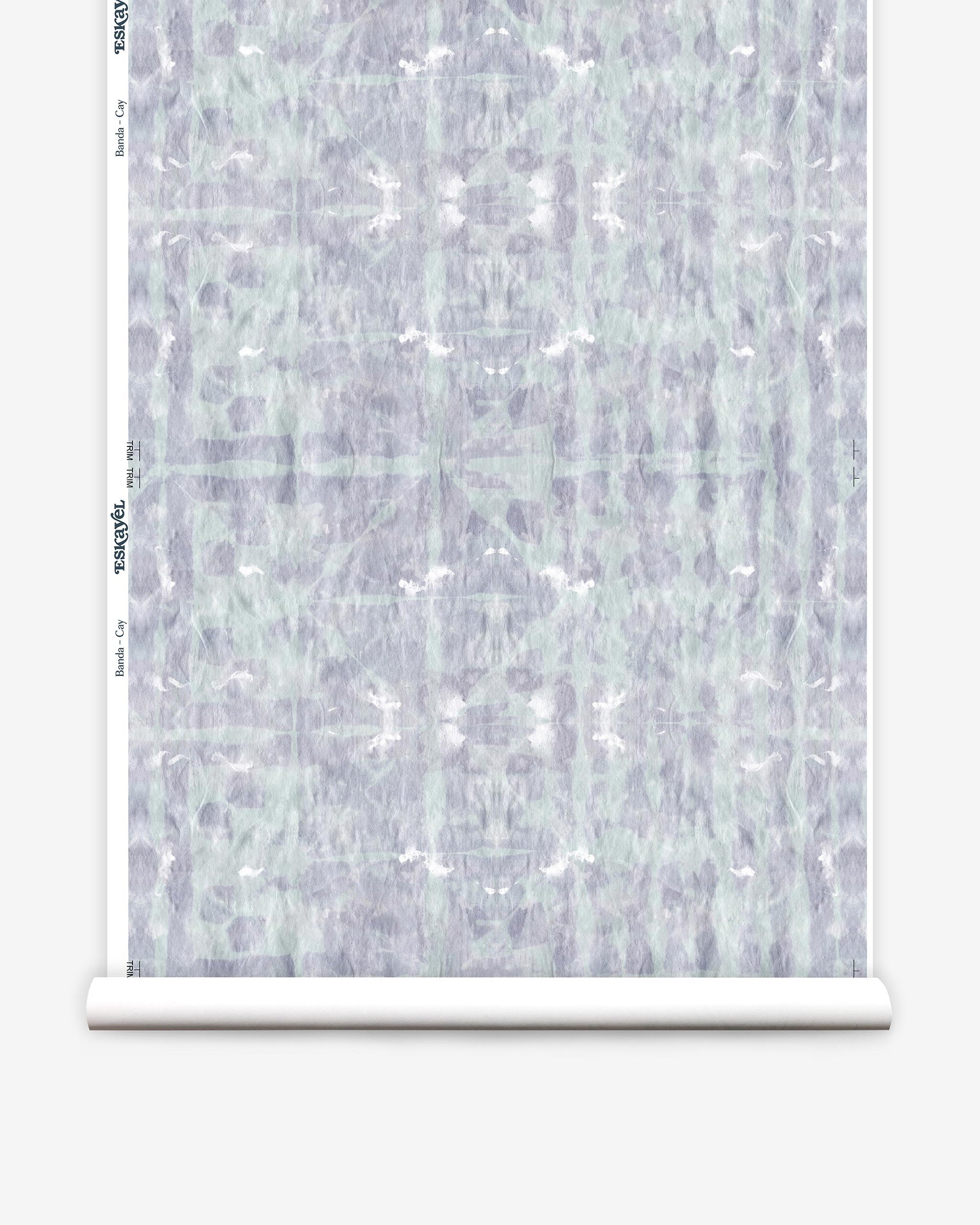 Partially unrolled wallpaper yardage in an abstract dyed grid print in mottled purple and turquoise.