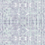 Detail of wallpaper in an abstract dyed grid print in mottled purple and turquoise.